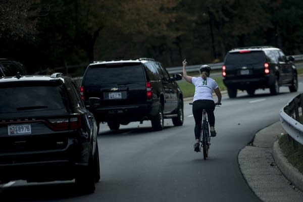 Woman fired for flipping off the president