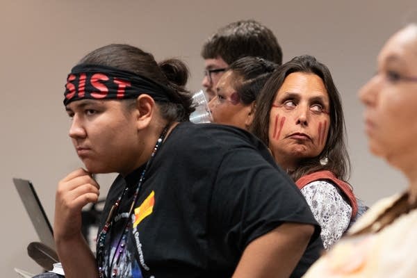 Youth climate intervener Nolan Berglund and activist Winona LaDuke.