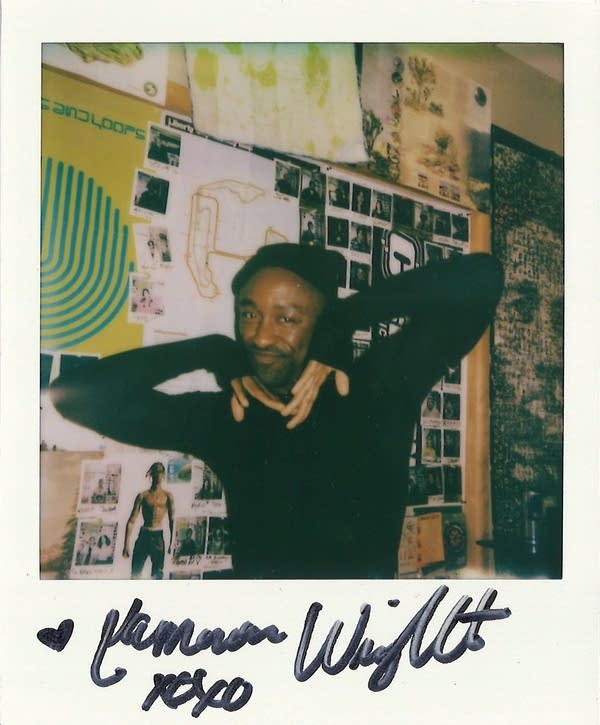 a signed polaroid with a person in it