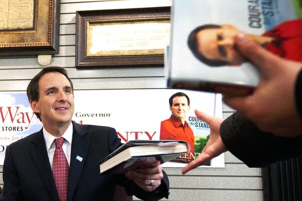 Former Gov. Pawlenty returns a signed book