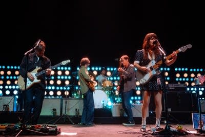 Rilo Kiley performing on stage