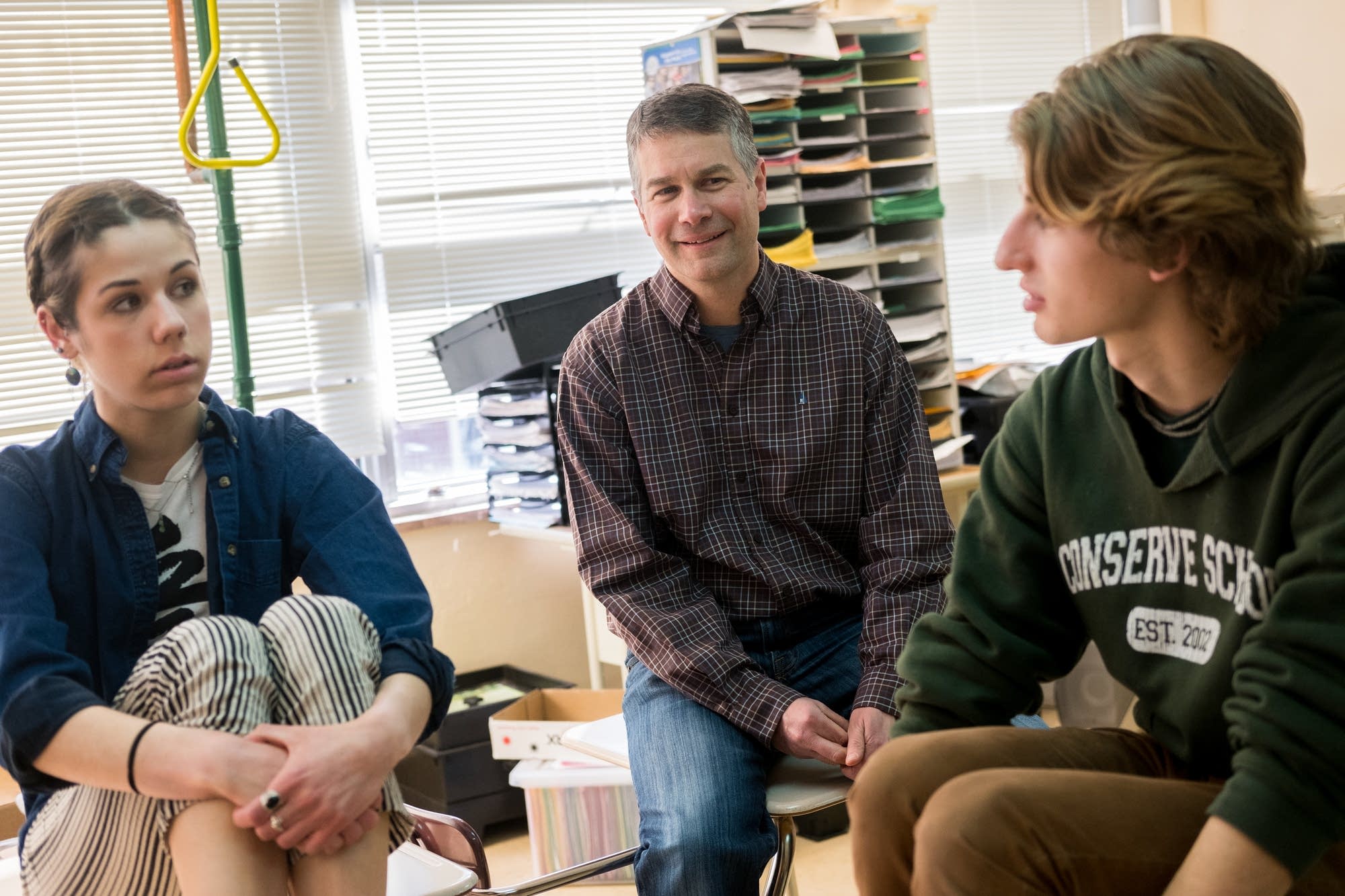 Larry Kraft speaks with two iMatter students.
