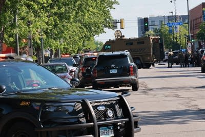 Suspect in custody after shots fired at deputies serving arrest warrant in Minneapolis