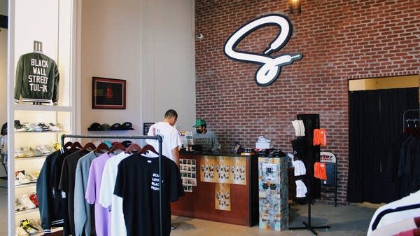 "We have a very fraught history of separation and division," Venita Cooper says. "Sneakers is one of those things that really brings people together."