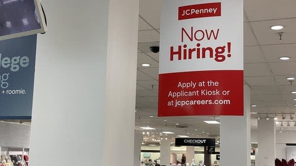 SAN BRUNO, CALIFORNIA - SEPTEMBER 01: A help wanted sign is posted inside a JCPenney store at The Shops at Tanforan on September 01, 2023 in San Bruno, California. Retailer JCPenney announced plans to invest over $1 billion to revamp its struggling 121-year-old department store chain by remodeling stores and its online shopping website and app.