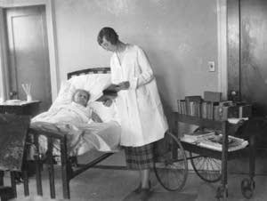 Librarian reads to patient