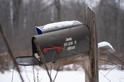 The mailbox sits open outside of the Closs home in Barron, Wis.