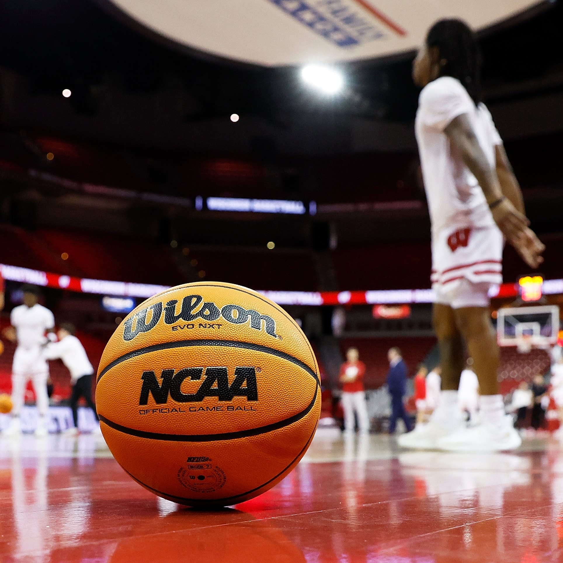 cover of episode Adding student athlete pay to the college sports equation