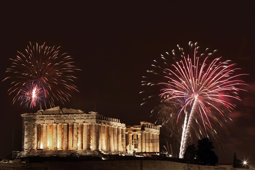 Fireworks burst over the ancient temple in Greece