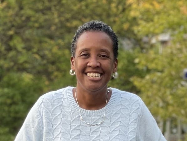 A woman poses for a photo.