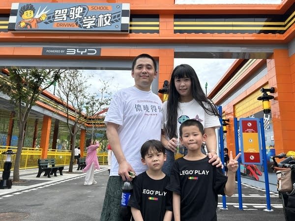 Cai Tian and his family posing at Legoland Shanghai