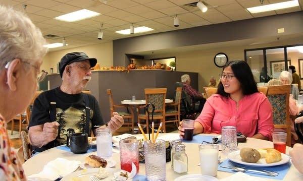  Ashley McGaw has lunch with John Bernadot at Senior Living at Watkins.