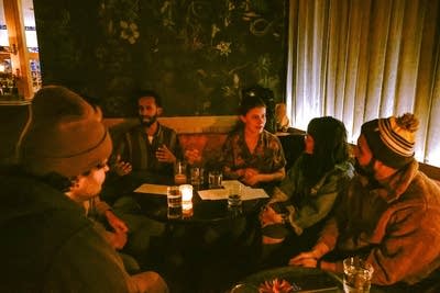 people enjoying music and drinking 