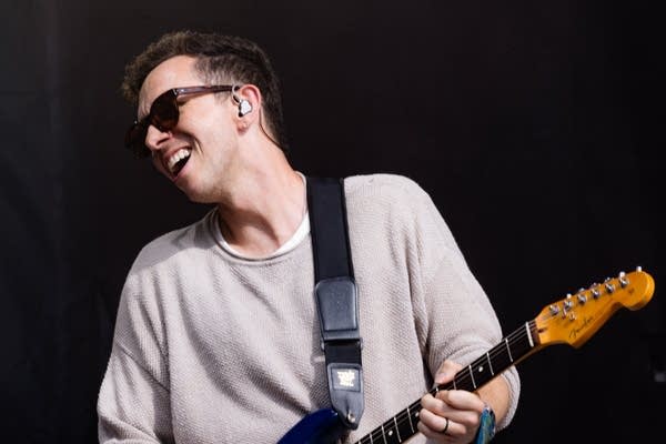 cory wong playing guitar on stage