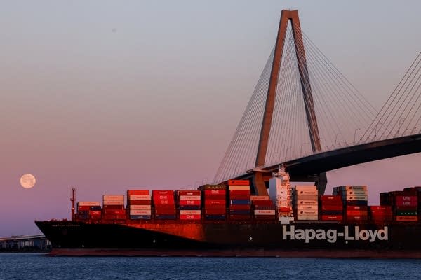 A container ship passes under the Arthur Ravenel Jr. Bridge in South Carolina.