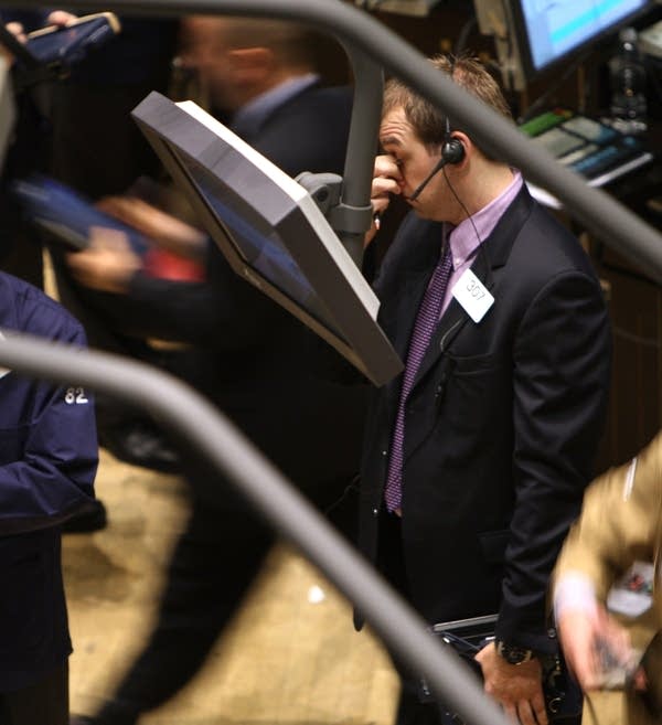 A trader on the New York Stock Exchange floor
