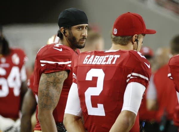 By sitting, a quarterback takes a stand