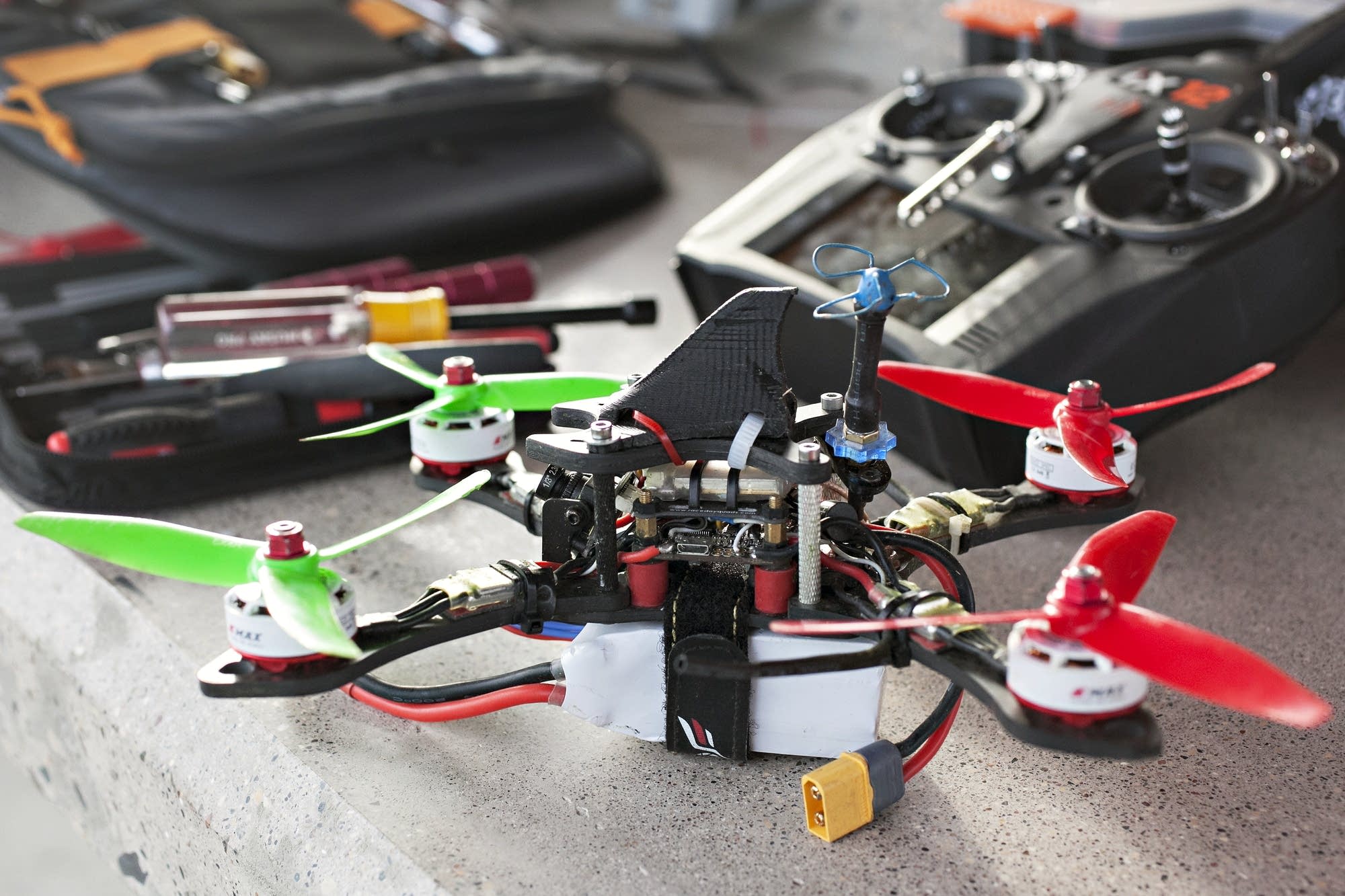 Members of the FM Quad Squad use drones with four propellers for races.