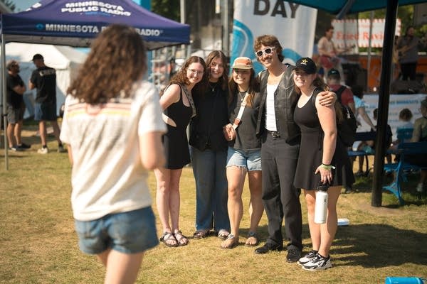 colin bracewell posing for a photo with other people