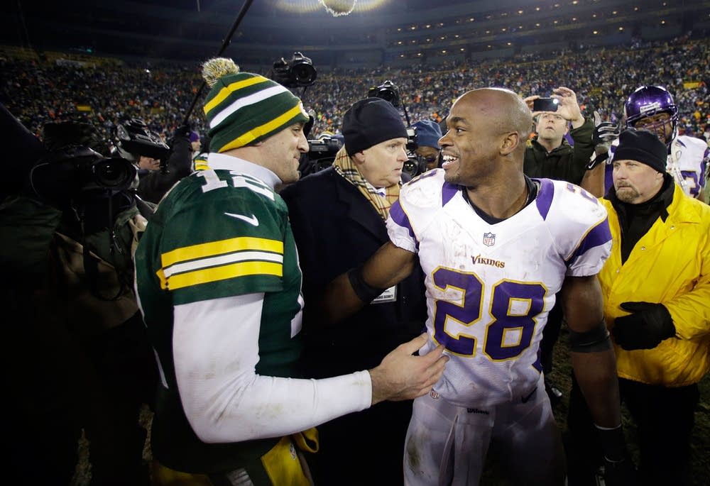 Aaron Rodgers, Adrian Peterson