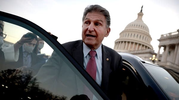 Sen. Joe Manchin, a West Virginia Democrat, said Thursday that he had agreed to support the Biden administration's climate change package. 