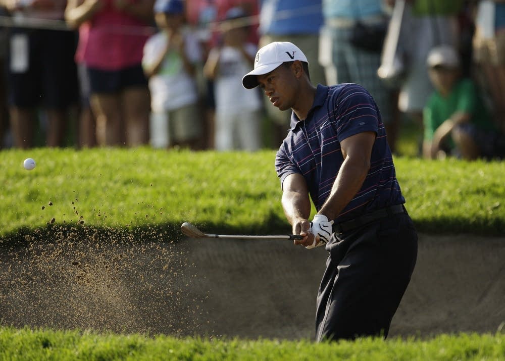 Woods practices at Hazeltine