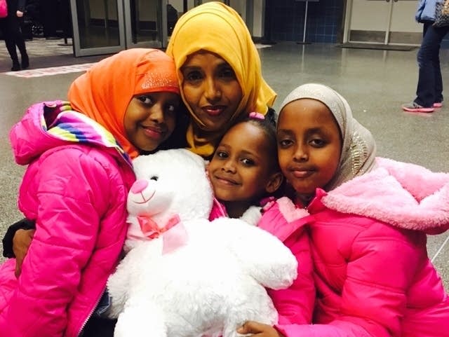 Mushkaad Abdi is reunited on Thursday with her mother and sisters.