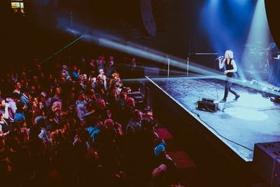 Band performing and crowd watching