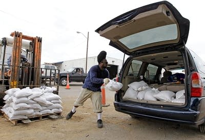 Loading sandbags
