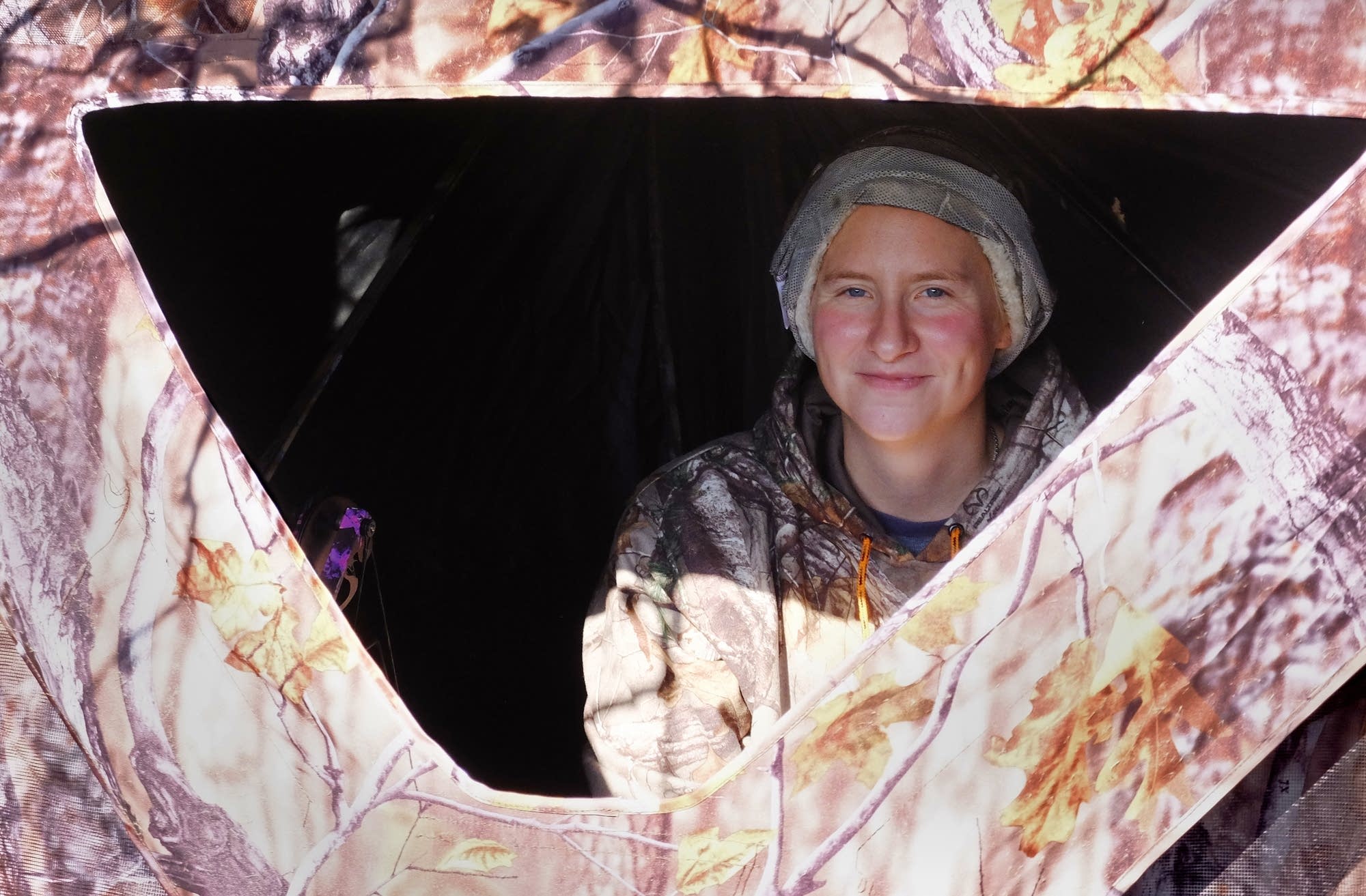 Misty Stoll settles in to her deer hunting blind.
