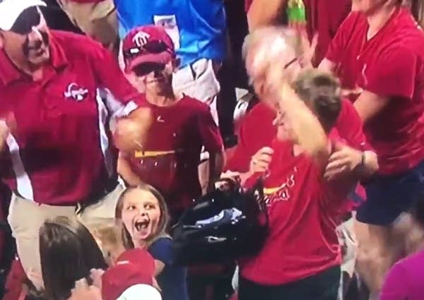 No glove? No problem. Fan has a purse
