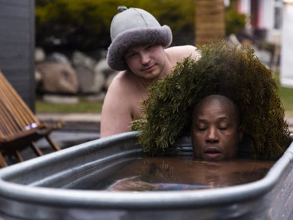 A person takes in a cold bath