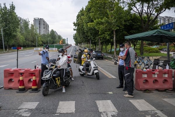 There's discontent over China's strategy of eliminating COVID-19 infections by locking down apartment blocks after just one new case.