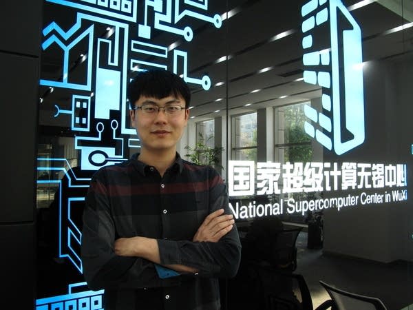 Person standing outside National Supercomputer Center in China