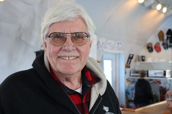 A man poses for a photograph.