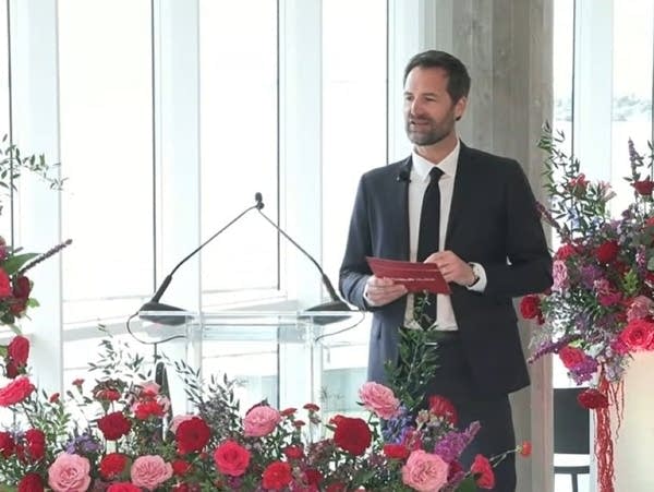 A man speaks during a news conference