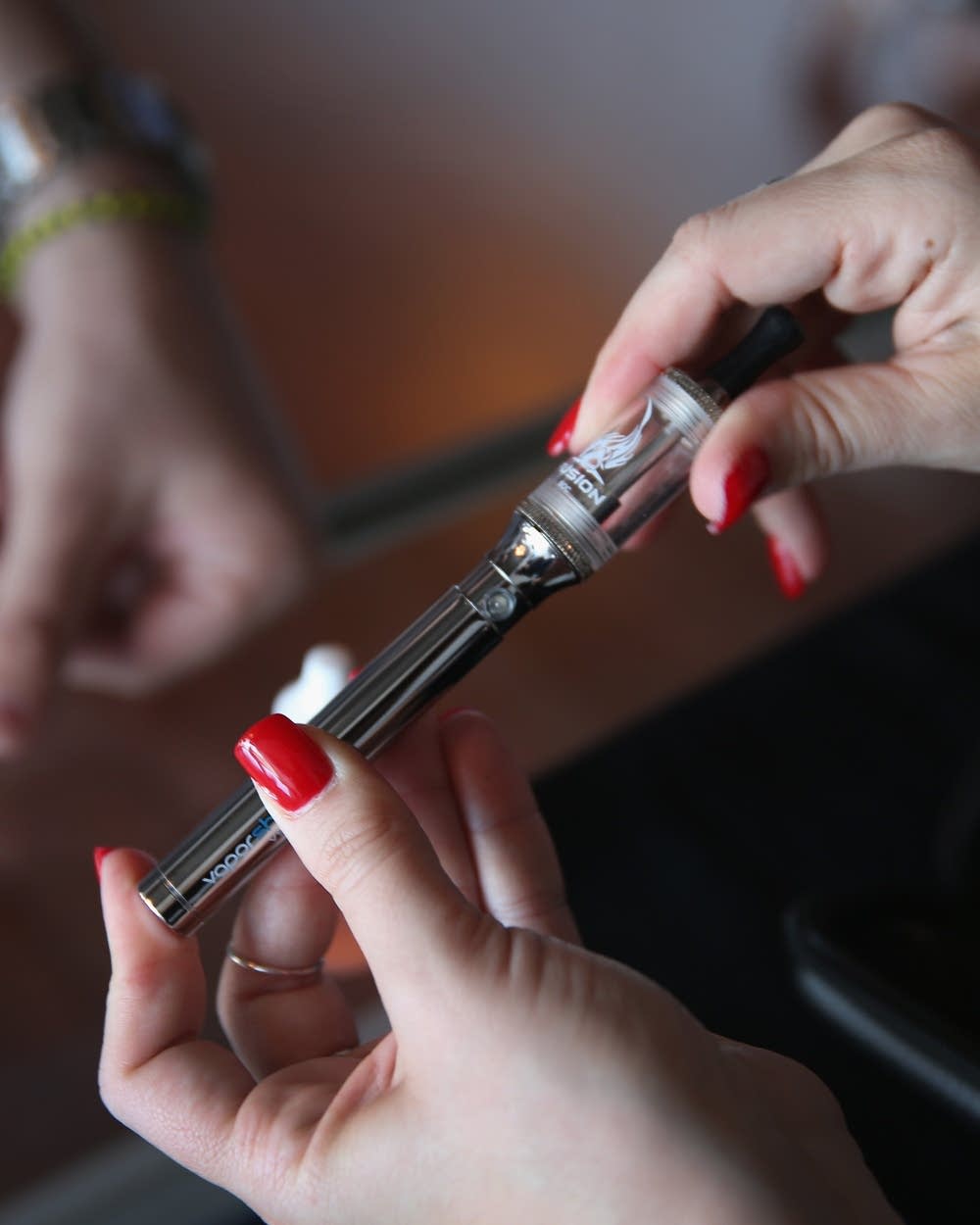 Survey finds e-cigarettes surpass regular smoking for U.S. teens | MPR News