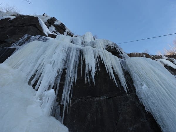 Ice forms on a cliff face