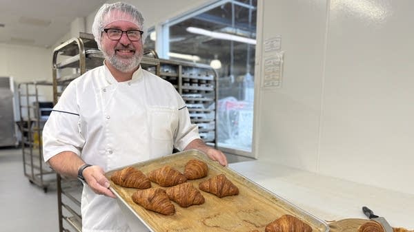 Brian Wood, owner of Starter Bakery, with the Savor croissants he made.