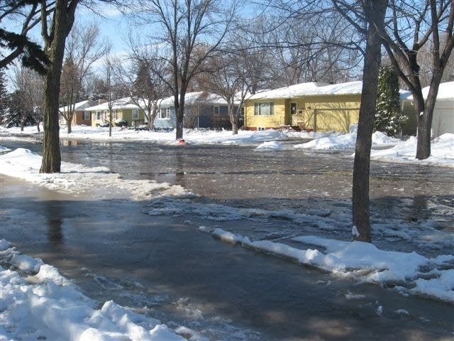 Water freezes on the streets