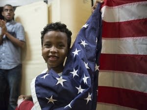Boy waves flag