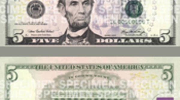 Front and back of new $5 bill to be issued March 15.