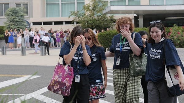 Elon Musk's DOGE cuts have affected tens of thousands of government workers. Above, are U.S. State Department employees who were recently laid off. 