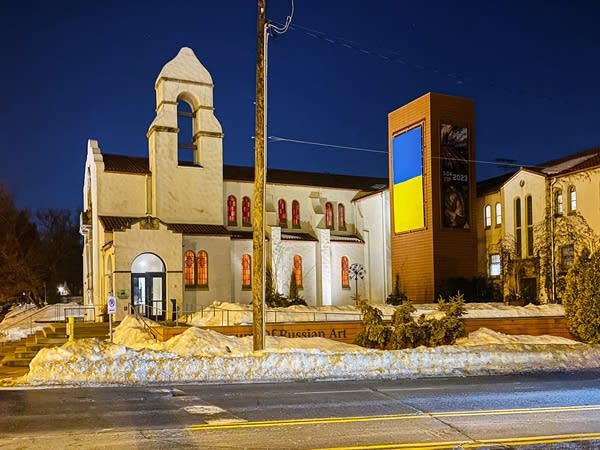 A building with a Ukraine flag on the outside