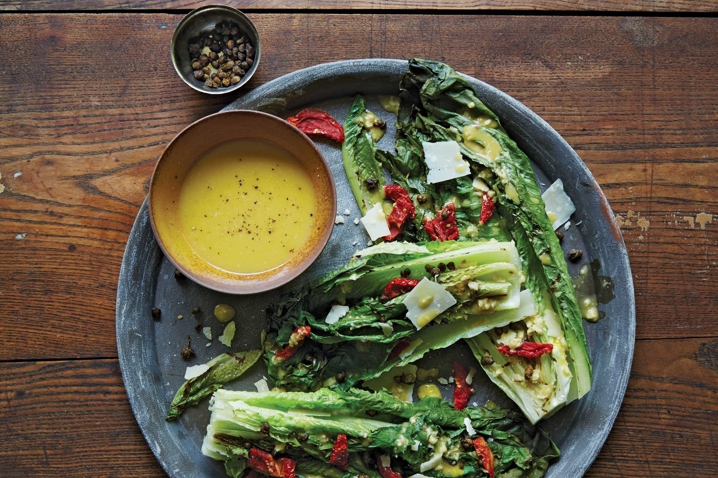Grilled Caesar Salad with SunDried Tomatoes and Fried Capers The