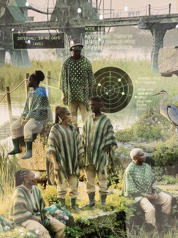 An image showing people in green ponchos with computer-like text over it.