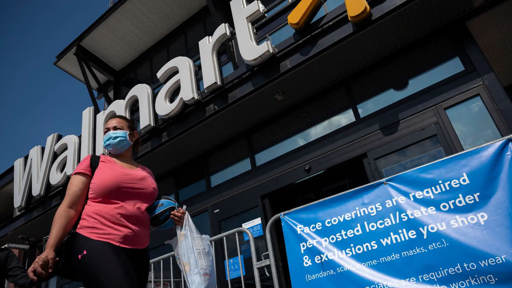 shopper in front of Walmart