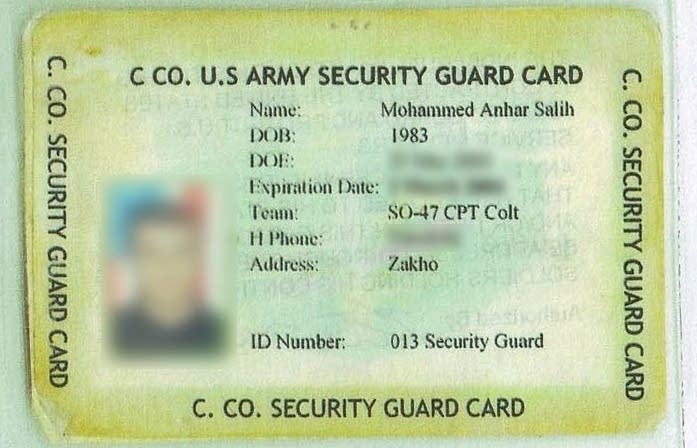 Salih's identification badge