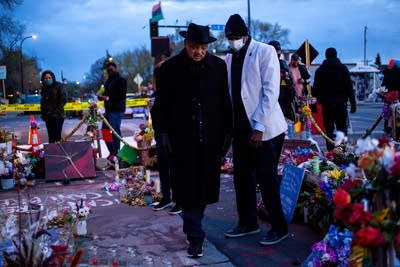 Rev. Jesse Jackson walks through the memorial at George Floyd Square