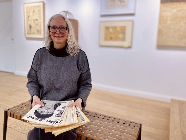 person holding photos